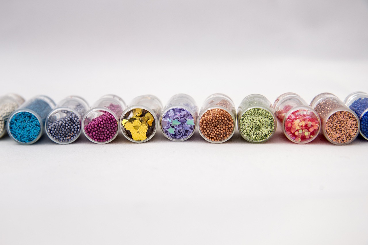 A row of glitter pots for nail art